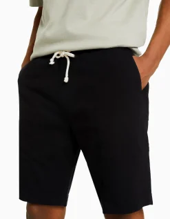 HOMME BERSHKA Bermudas*Bermuda jogger effet rustique