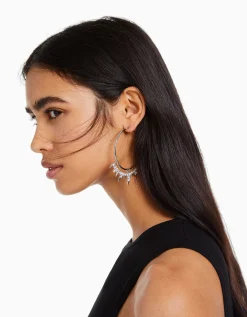 FEMME BERSHKA Tout voir*Boucles d’oreilles anneaux pics strass