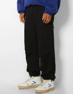 HOMME BERSHKA Pantalons*Jean cargo parachute