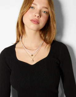 FEMME BERSHKA Tout voir*Lot 4 colliers chaîne cœur