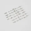 FEMME BERSHKA Tout voir*Lot 20 paires de boucles d’oreilles croix papillon