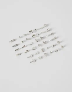 FEMME BERSHKA Tout voir*Lot 20 paires de boucles d’oreilles croix papillon