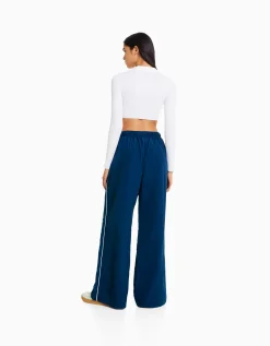 FEMME BERSHKA Vêtements*Pantalon effet nylon passepoil sur le côté