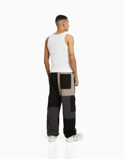 HOMME BERSHKA Cargo et parachute*Pantalon jogger cargo color block
