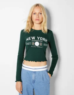 FEMME BERSHKA Tee-shirts*Top cropped manches longues imprimé