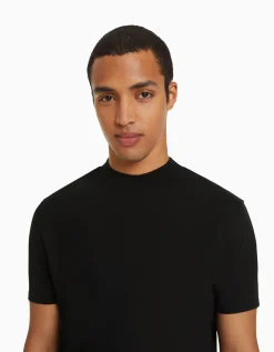 FEMME BERSHKA Personnalisables*T-shirt à manches courtes et col montant