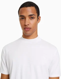 FEMME BERSHKA Personnalisables*T-shirt à manches courtes et col montant